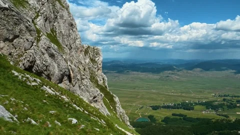 Vast valley stretches below, dotted with trees. Savin Kuk peak, Montenegro 스톡 동영상 342980252