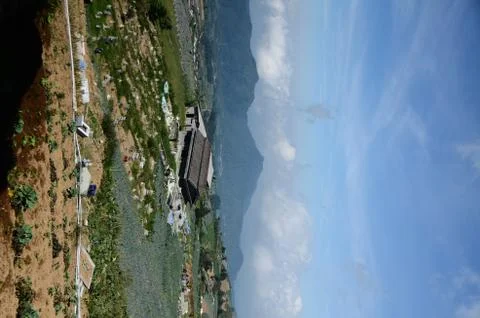 Vast vegetable fields on the mountainside Stock Photos