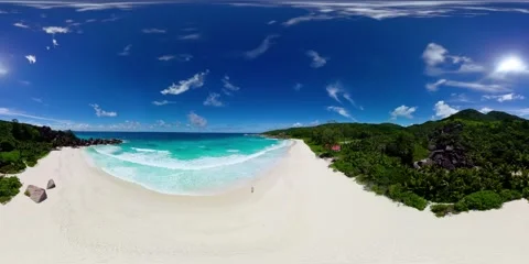 Vast white sand beach with turquoise waves. La Digue, Seychelles. Stock Footage 301446586