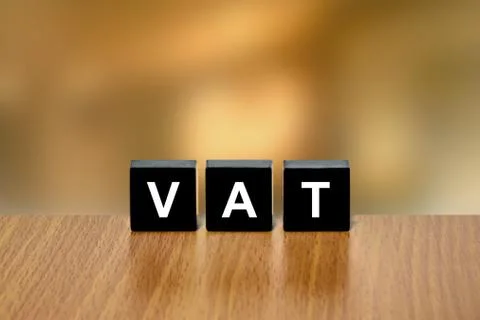 VAT or value added tax on black block Stock Photos