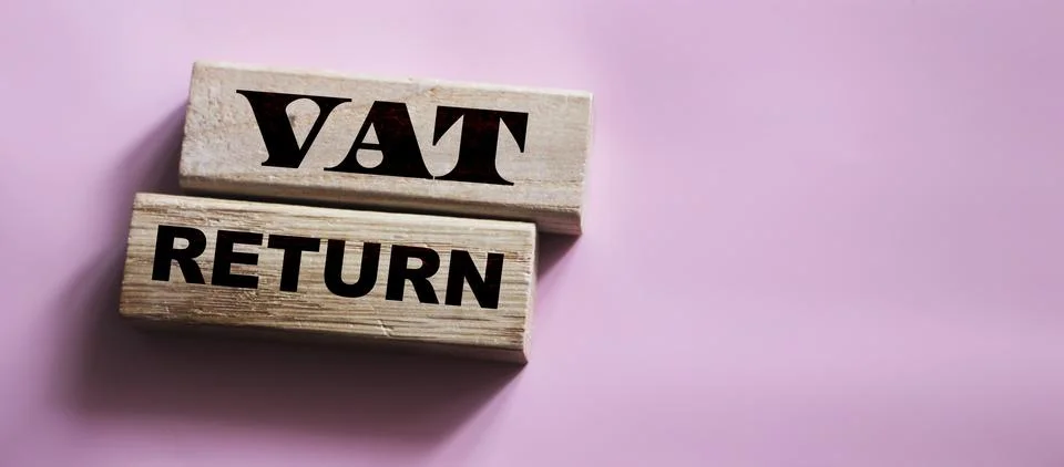 VAT return text Value Added Tax return on wooden blocks. Financial concept Stock Photos