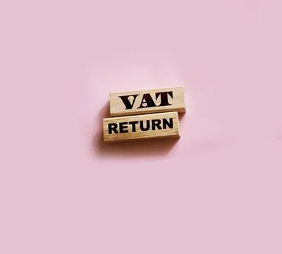 VAT return text Value Added Tax return on wooden blocks. Financial concept 写真素材
