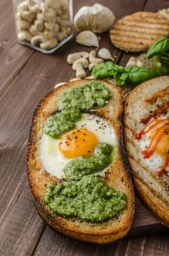 Vatiations of fried eggs inside bread 스톡 사진