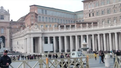 The vatican courtyard inside it pan from right to left with people pedestrians Stock Footage 252147996