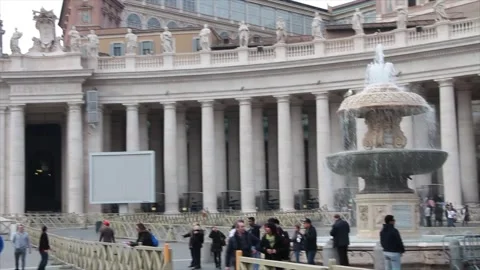 The vatican courtyard inside it pan from right to left with fountain and people Video stock 252148016