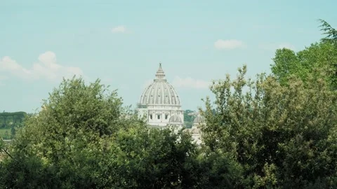 Vatican dome from a distance looking through trees Stock Footage 230025372