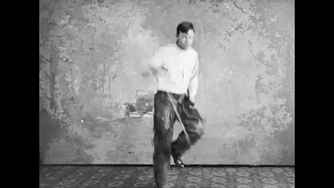 Vaudeville Performer Demonstrates Lasso Techniques On Stage Stock Footage 132286458