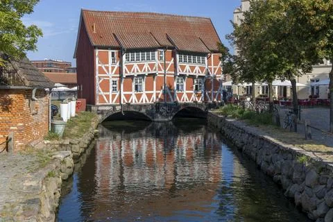 Vault, heritage-protected half-timbered house with reflection in the water, Stock Photos