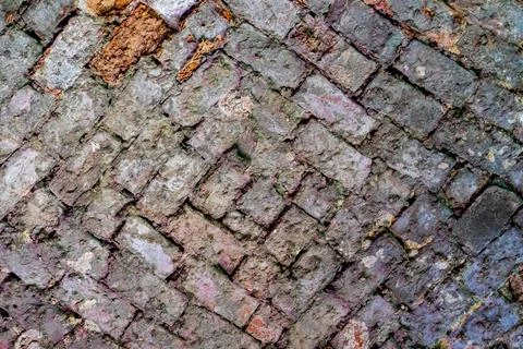 The vaulted ceiling of an ancient temple made of red brick Clous up Stock Photos