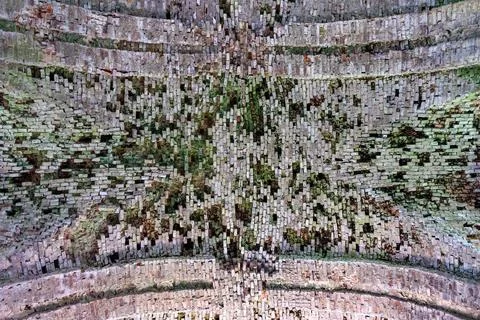 The vaulted ceiling of an ancient temple made of red brick Stock Photos