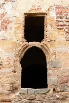 Vaulted Gothic window on the ruins of a Gothic castle Stock Photos