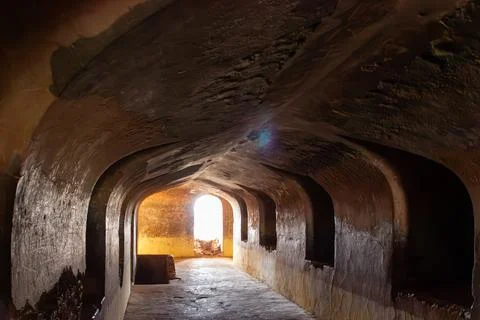 Vaulted Passageway with Distant Light Stock Photos