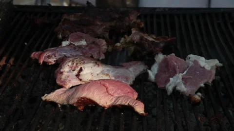 Veal meat roasting at barbecue  Stock Footage 36839415