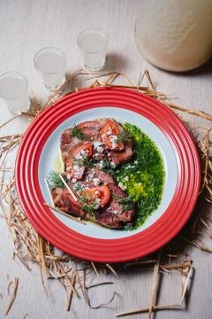Veal in a sauce with vegetables Stock Photos