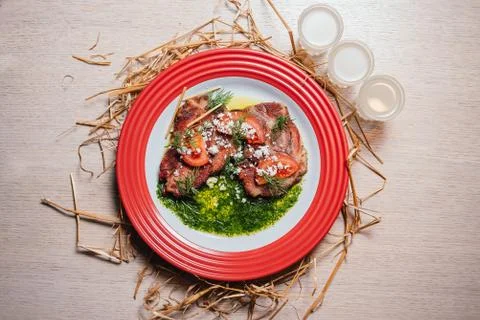 Veal in a sauce with vegetables Stock Photos