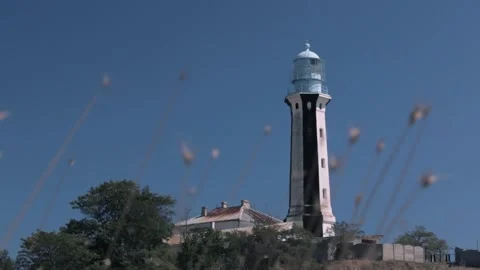 Вeautiful Black And White Lighthouse. Windy Sunny Day Stock Footage 170601423