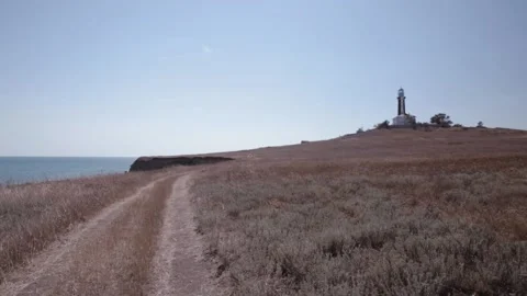 Вeautiful Black And White Lighthouse. Windy Sunny Day Stock Footage 170601427