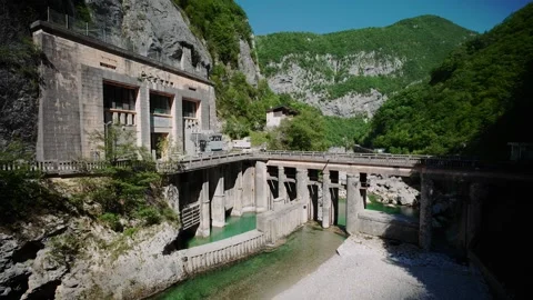 Vecchia diga di Barcis old dam and Edison historic hydroelectric facility in Stock Footage 340197146