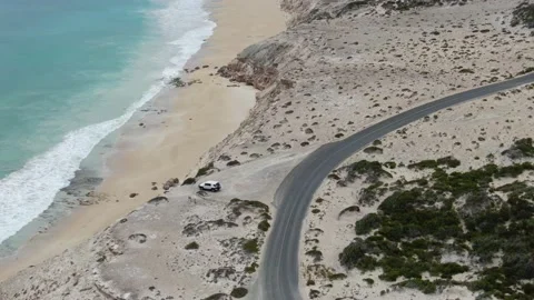 Vechicle in Front of Empty Paradise Beach Stock Footage 158964087