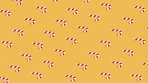 Vector Christmas candy canes fly diagonally pattern loop on a orange background Stock Footage 144267149