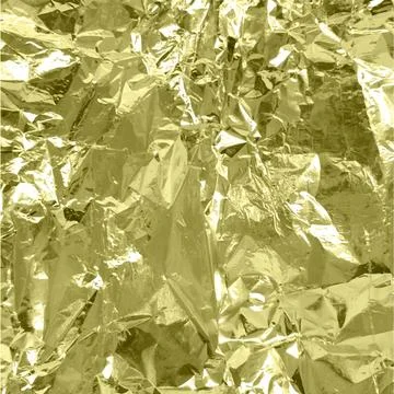 Vector of crumpled gold foil texture. Metallic paper. Stock Illustration