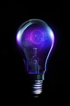 Vector design is showing light bulb hanging in backdrop with glowing filament Stock Photos