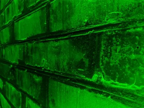 Vector green grunge background, gradient dark texture of an old brick wall Illustrazione stock