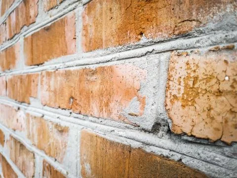 Vector grunge background with the texture of an old brick wall consisting Illustrazione stock