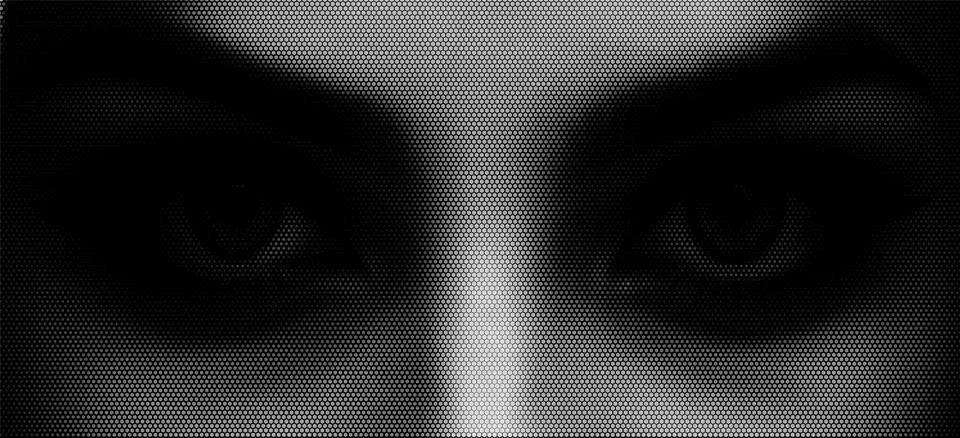 Vector illustration of a human eye made using a halftone hexagon pattern. Stock Illustration