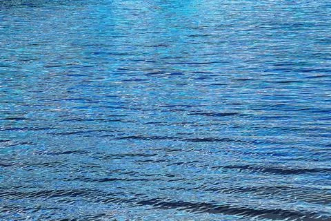 Vector illustration of water ripple texture background. Wavy water surface du Stockillustratie