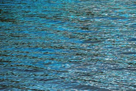 Vector illustration of water ripple texture background. Wavy water surface du Illustrazione stock