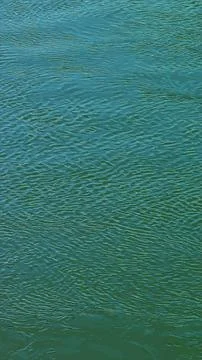 Vector illustration of the water surface texture of the Salzach river. Vectic Stock Illustration