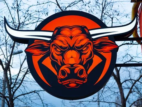 Vector image of the head of an angry bull. Exterior store sign. Stock Photos