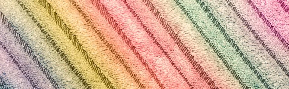 Vector seamless pattern with colorful rainbow hand drawn knitted stripes Foto stock