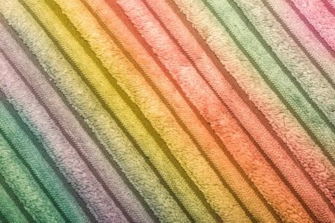 Vector seamless pattern with colorful rainbow hand drawn knitted stripes Foto stock