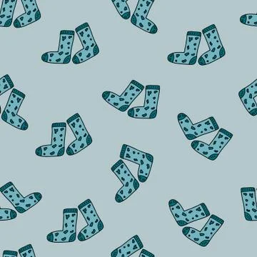 Vector seamless pattern with knitted socks on green background. Winter and au Illustrazione stock