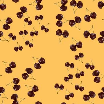 Vector seamless pattern with ripe cherries on orange background Stock Illustration