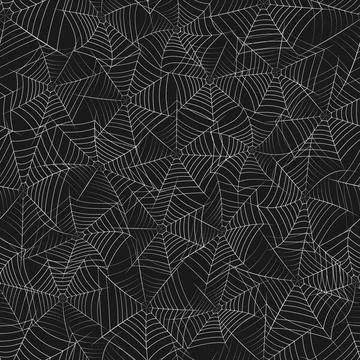 Vector seamless texture with grayscale spider web on a black background. Illustrazione stock