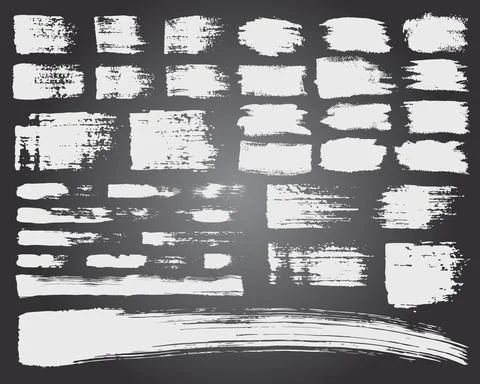 Vector Set of brush acrylic strokes. White color on black background. Hand Illustrazione stock