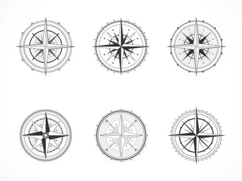 Vector set of vintage compasses or marine wind roses. Illustrazione stock