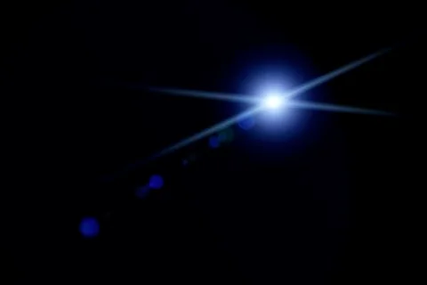 Vector star, sun with lens flare Stock Illustration