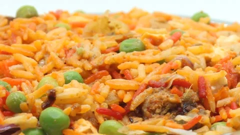 Veg biryani recipe with selective focus Stock Footage 165549163