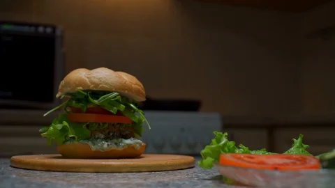 Vegan burger on the kitchen table Stock Footage