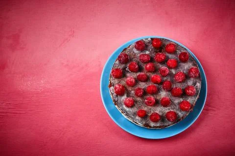 Vegan cake with coconut layer, dates and cherries Stock Photos