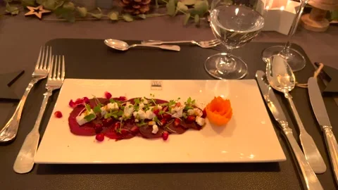 Vegan carpaccio made from beetroot with sheep milk cheese and cress. Zoom in. Video stock 145750037