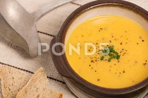 Vegan carrot and potato soup Stock Photos