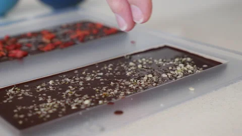 Vegan chocolate making adding hemp seeds. Video stock 137156981