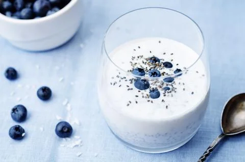 Vegan coconut Chia seed pudding with blueberries. toning. selective focus Stock Photos