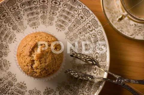 Vegan muffin on antique plate Stock Photos