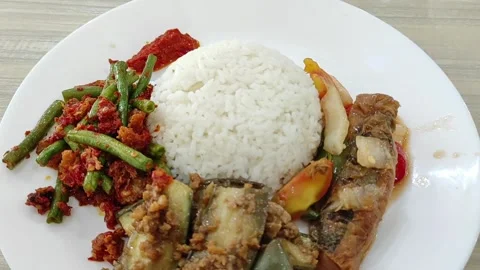 A vegan rice dish with assorted vegetables Stock Footage 263600803